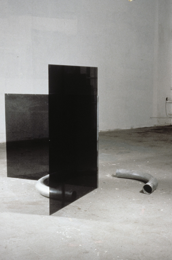 Lassitude of the Finite III, sideview
black glass, galvanized tubing

H. apx. 48″