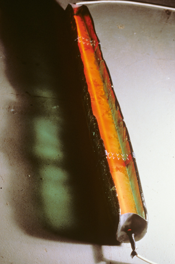 Primordial/Underived I
cast glass, liquids, neon, lead

H. 5″  L. 48″   W. 6″